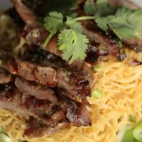 Egg Noodle with BBQ Pork · Egg Noodle topped with tasty home marinated pork, Yu Choy and green onion.