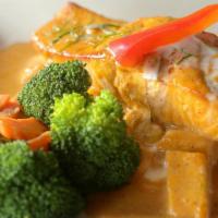 Chu Chee Salmon (Entrée size doesn't come with rice) · Salmon fillet topped with flavorful red curry coconut sauce, served with steamed broccoli.