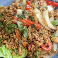 Pad Graprow (Entrée size doesn't come with rice) · Stir-fried thai basil with garlic, chili, onion, bell pepper and choice of meat or tofu.