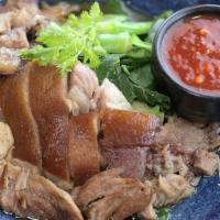 Braised Pork Leg ขาหมู (Entrée size doesn't come with rice) · Slow-cooked, savory pork leg, stewed with thai spices, served with chinese broccoli and dipp...