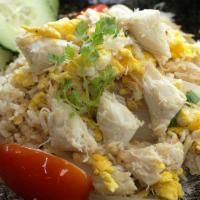 Crab Fried Rice · Fried rice with egg, green onion, yellow onion, tomato and real crab meat.