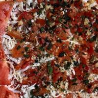 Pizza Margherita · Tomato sauce, oregano, mozzarella and fresh basil.
