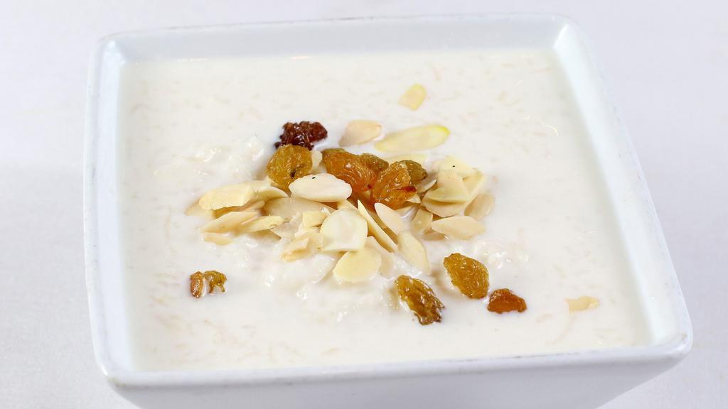 KHEER · Dessert made from basmati rice cooked with sugar, milk and served cold with almonds & pistachio nuts.