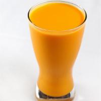 MANGO LASSI · A refreshing drink with homemade yogurt & indian alfanso mango juice.