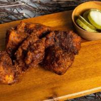 Fried Nashville Hot Chicken Tenders · Perfect pluck! Our extra crispy Nashville hot chicken tenders lightly battered and fried. Ga...