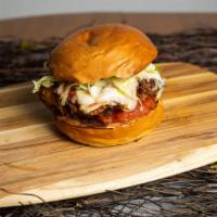 Comfort Chicken Parmesan · Best of the barnyard - chicken Parmesan sandwich topped with mozzarella cheese and marinara ...