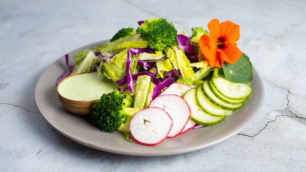 Lettuce Romaine Calm · Romaine, red cabbage, broccoli, cucumber, radish, cilantro, jalapeño cilantro dressing.