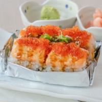 Lion King · California roll with salmon baked, top with tobiko and special sauce.