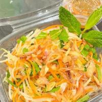 Papaya Salad · Green papaya, carrots, mint, crispy shallots. Includes Vietnamese Vinaigrette sauce.