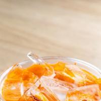 Thai Iced Tea · Refreshing and sweet!  Contains dairy.