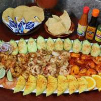 Botana Tequila's · Seafood tower, bathed in delicious tequila’s secret sauce and chiltepin
. Pepper, cooked shr...