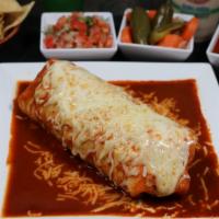 Super Burrito Mojado · 14” Flour tortilla covered with our homemade and delicious tomato sauce, stuffed with rice, ...