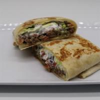 Tequila's Quesadilla · 14” Flour tortilla filled with your favorite choice of meat, creamy melted cheese, pico de g...