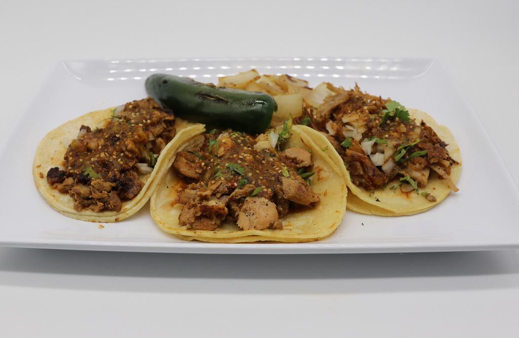 Soft Taco · Tasty corn tortilla, choice of meat, onion, cilantro, salsa.