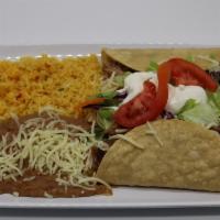  Double Crispy Taco Combo · 2 choice of meat. Two crunchy hard shell tortillas, filled with your favorite choice of meat...