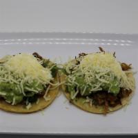 Super Taco · Corn tortilla, delicious choice of meat, fresh cheese, guacamole, sour cream, onion, cilantr...