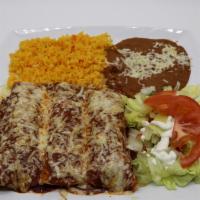  Red Enchiladas · Three rolled corn tortillas filled with your choice of meat, topped with our tasty homemade ...