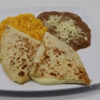 Kids' Platter · 7” flour quesadilla filled with delicious creamy melted cheese, served with rice, refried be...