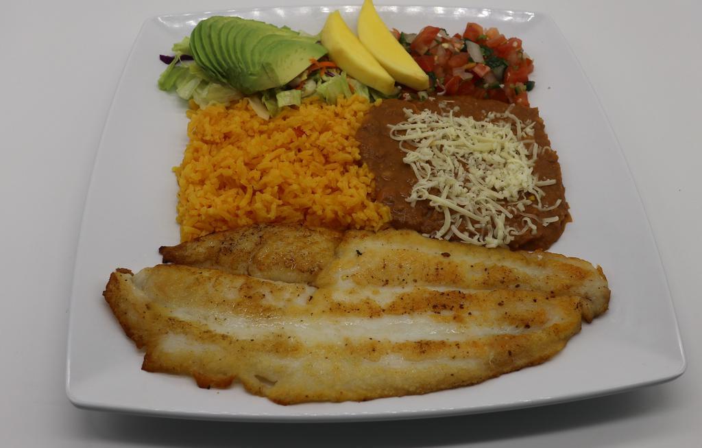 Filete a la Plancha · Fresh-grilled swai fillet slightly spiced, served with avocado slices, sour cream, salad, fried beans, and rice.