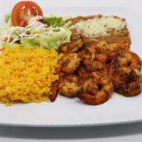 Camarones a la Plancha · Fresh shrimp grilled to tenderness, sautéed with our special mild spicy sauce, served with s...