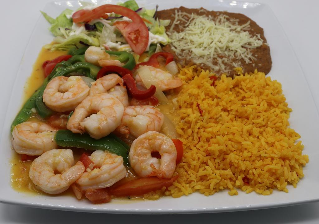 Camarones al Tequilazo · Fresh shrimp sautéed with wine and spiced with the secret recipe, green and red peppers, tomato and onions served with salad, rice, fried beans, cheese, fresh
guacamole and sour cream.
