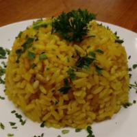 Side of Rice Pilaf · Our house rice pilaf with Saffron, Tumeric, currants, and garbanzo.