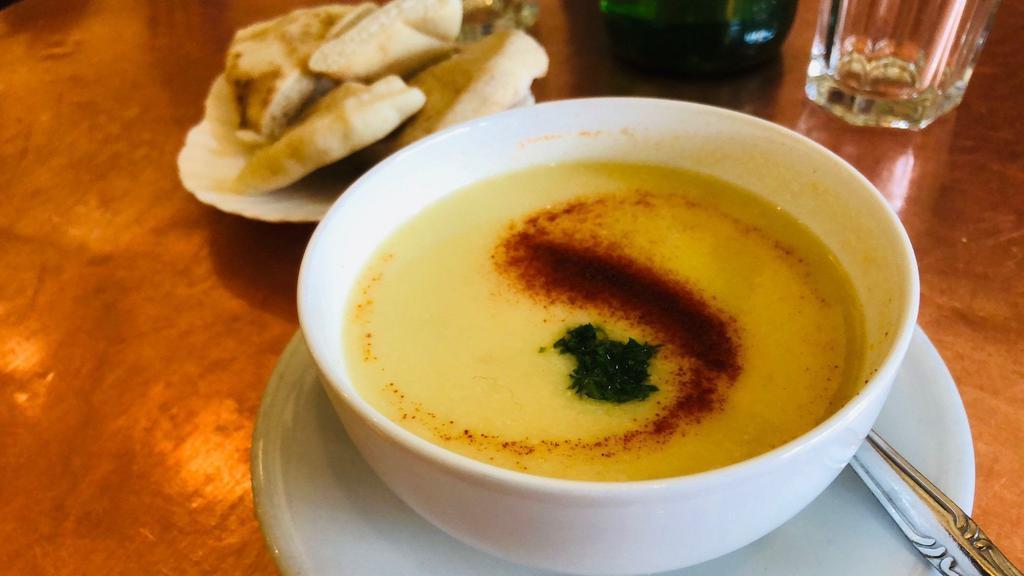 Avgolemono Soup · Our famous traditional Greek chicken, lemon and rice soup
