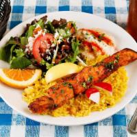 Salmon Kebab (Lunch) · Salmon marinated in a dill tomato sauce, skewered, grilled and served over rice pilaf. (one ...