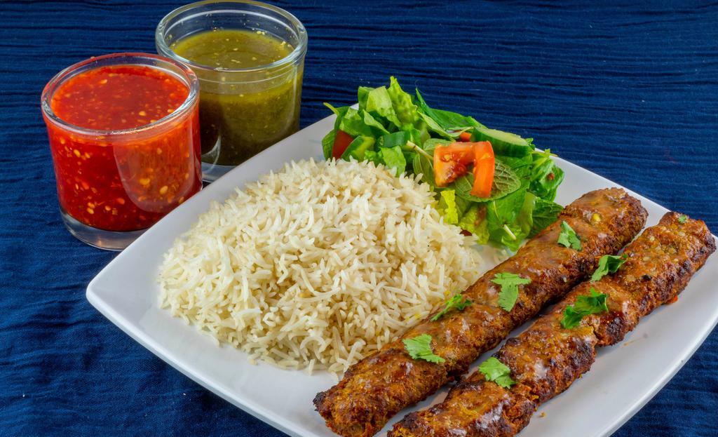 Beef Shami Kabob · Two skewers of freshly grilled ground beef seasoned in our special blend of spices. Served with rice naan and a garden salad.
