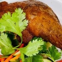 1. Braised Duck Leg a la carte · served with a side of pickled vegetables.