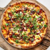 BBQ CHICKEN PIZZA · BBQ Sauce, Chicken, Bacon, Red Onions, Cilantro