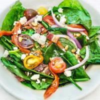 SPINACH SALAD · with roasted red peppers, red onion, tomato, bacon, crumbled feta, toasted pine nuts served ...