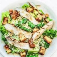 CHICKEN CAESAR SALAD · crisp romaine, sliced chicken breast, housemade croutons, freshly grated parmesan served wit...