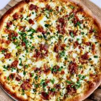 New Haven White Clam Pizza · Clams, garlic, seasonings, olive oil, bacon, no tomato sauce.