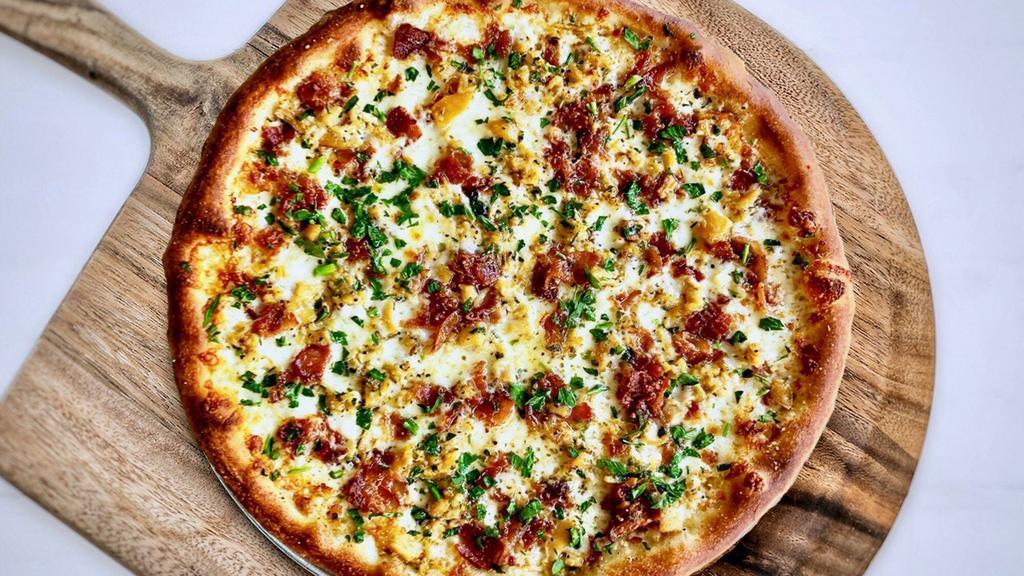 New Haven White Clam Pizza · Clams, garlic, seasonings, olive oil, bacon, no tomato sauce.