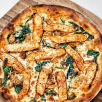 Pollo Pizza · Sliced chicken breast, baby spinach, slow-roasted garlic, and no tomato sauce.