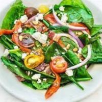 GLUTEN FREE SPINACH SALAD · Gluten-free salad with Roasted red peppers, red onion, tomato, bacon, crumbled feta, toasted...