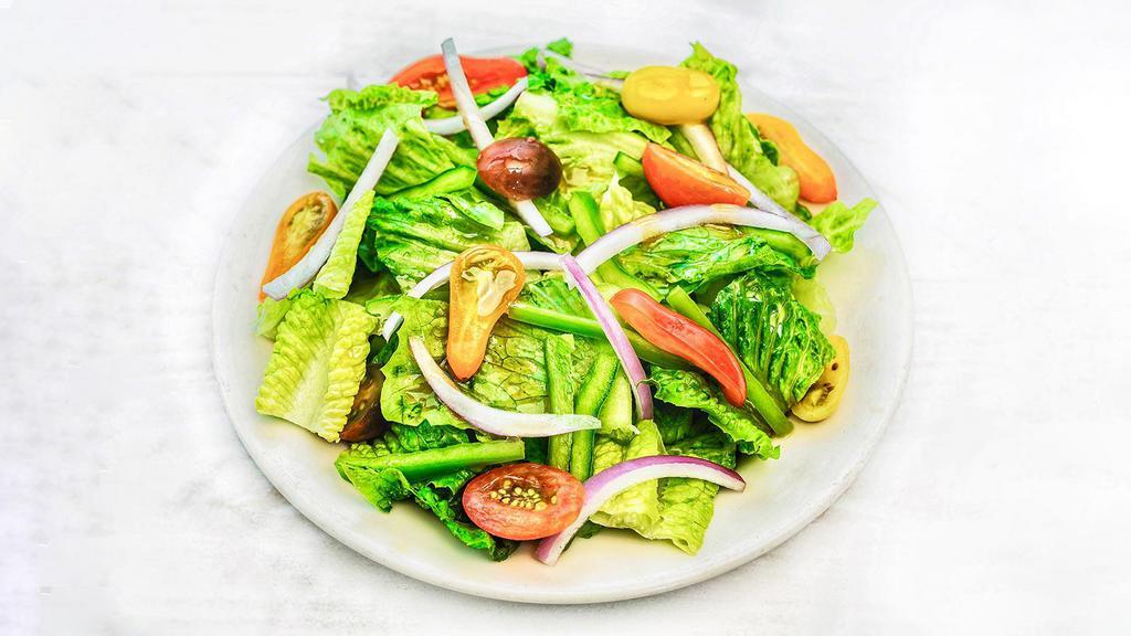 Garden Salad · Crisp romaine, tomato, red onion, green pepper.