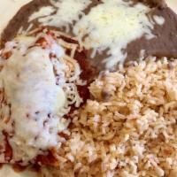 Enchiladas (Verdes) with Meat · Two corn tortillas stuffed with meat, covered in sauce.