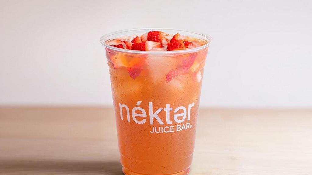Strawberry Green Tea Fresher · Refreshing Green Tea lightly infused with mint leaves and orange blossoms poured over ice and topped with diced fresh strawberries.