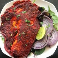 Grilled Masala Fish · Fish fillet pieces marinated in a thick Indian masala and grilled on griddle.