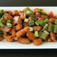 Baby Corn Manchurian · Baby corn dipped in a batter primarily made of corn flour, maida (soft wheat) and soy sauce ...