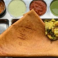 Masala Dosa · South Indian crepe delicacy made with rice flour and Lentil batter stuffed with mashed potat...