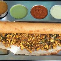 Paneer Dosa · South Indian crepe delicacy made with rice flour and Lentil batter roasted layered with chee...
