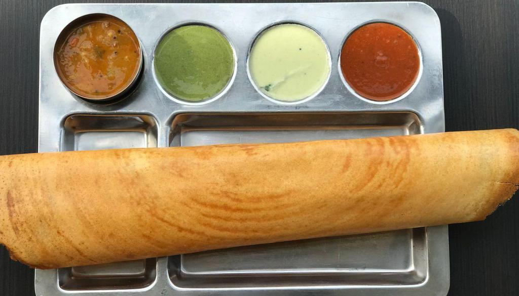 Plain Dosa · South Indian crepe delicacy made with rice flour and Lentil batter served with Chutneys and Sambar