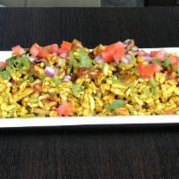 Bhel puri · Indian street food made with puffed rice, tamarind, mint topped in chat masala.