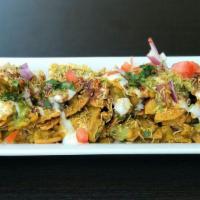 Papdi chaat · Snack assorted with crunchy base of Papdi (crisp puris) which is topped with mint, tamarind ...