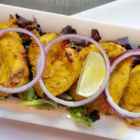 Achari Chicken Kebab · Chicken Breast Chunks marinated in the achari(pickled) masala and slow cooked in Tandoori