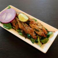 Chicken Seekh Kebab · Ground chicken marinated with Indian spices, rolled in skewers, slow cooked in tandoori