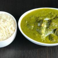 Palak paneer · Cottage cheese cooked with blended Indian spices spinach sauce.